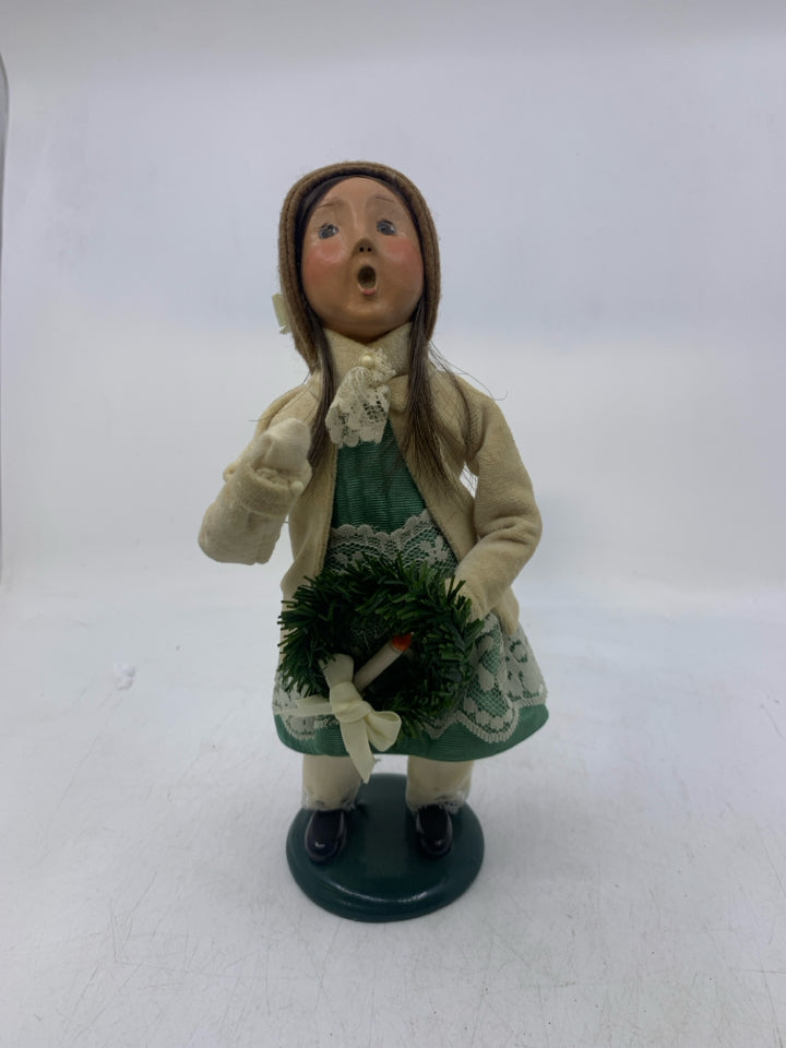 1997 BYERS' CHOICE GIRL WITH WREATH.