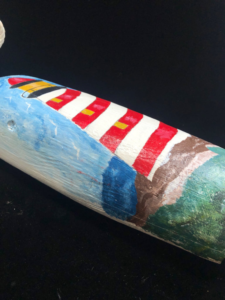 WHITE WOODEN BUOY W/PAINTED LIGHTHOUSE.