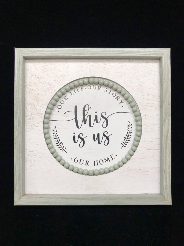 THIS IS US GREY WASHED WALL HANGING.