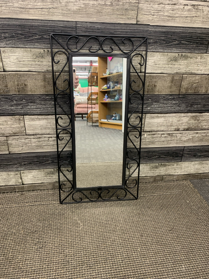 MIRROR W/ BLACK METAL FRAME WALL HANGING.