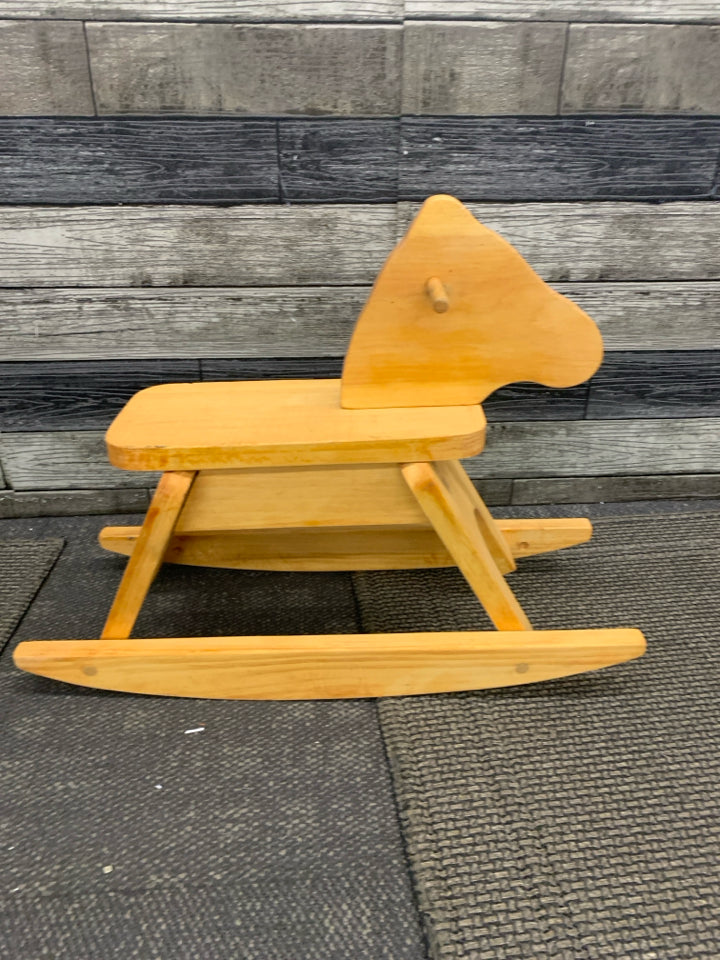 TAN WOODEN DECOR ROCKING HORSE.