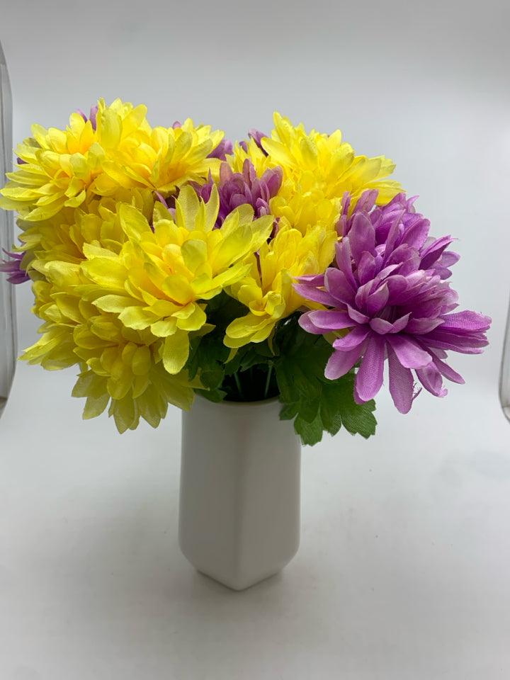 YELLOW & PURPLE FLOWERS IN WHITE VASE.