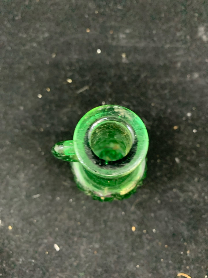 GREEN TEXTURED GLASS EMPTY BOTTLE W HANDLE.