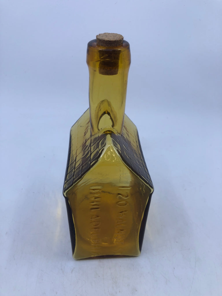 VTG OLD CABIN WHISKEY HOUSE SHAPED AMBER GLASS EMPTY DECANTER.