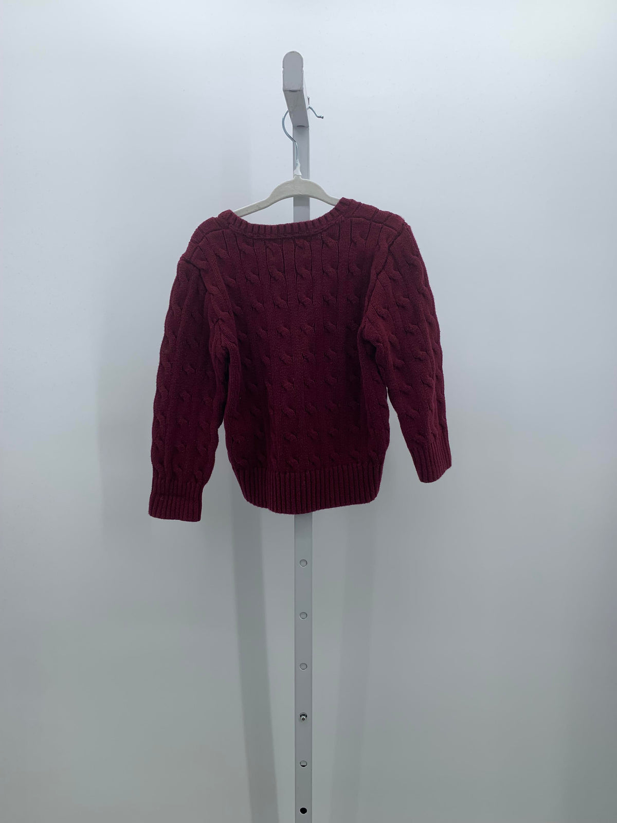 CABLED SWEATER