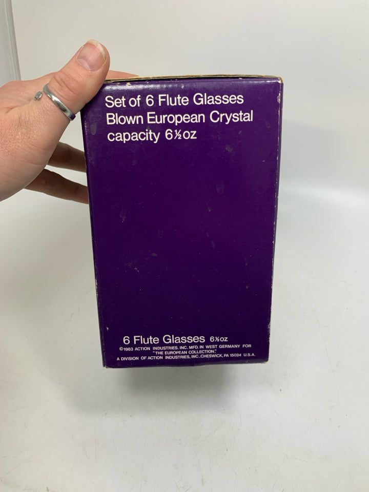 IN BOX 6 EUROPEAN CRYSTAL CHAMPAGNE FLUTES.