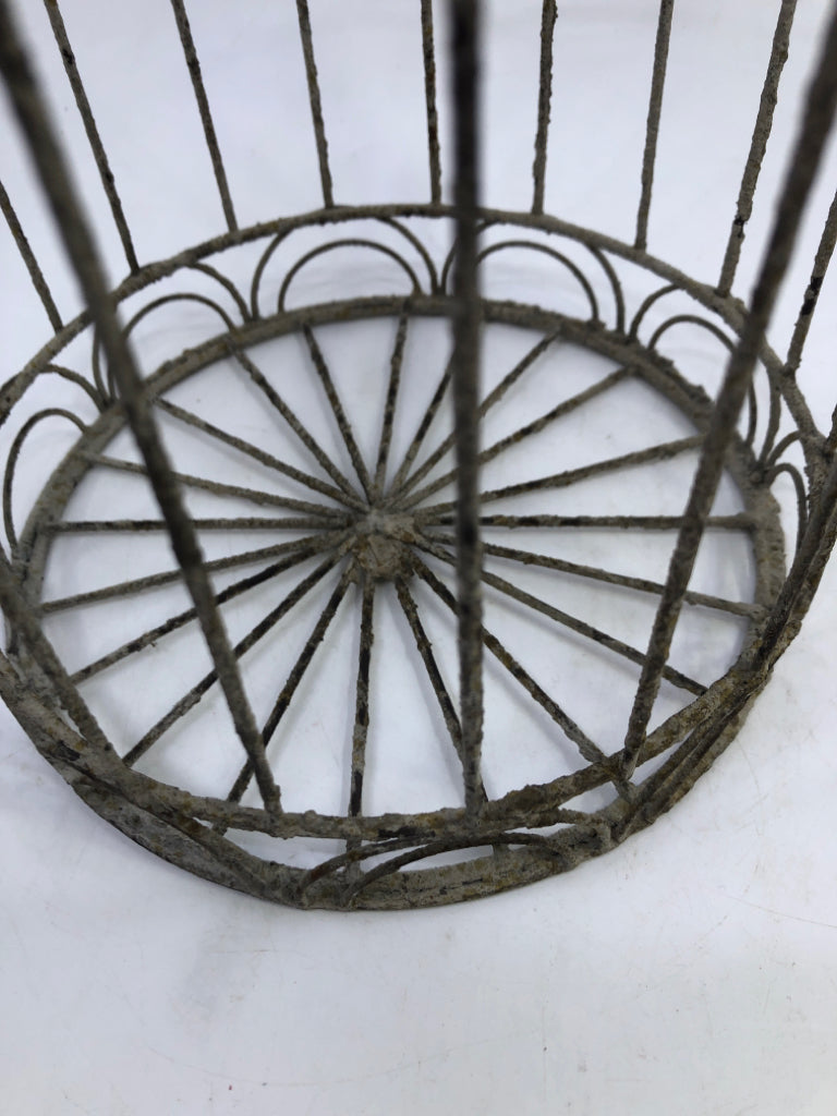 DISTRESSED METAL BIRD CAGE W/ BIRD ON TOP.