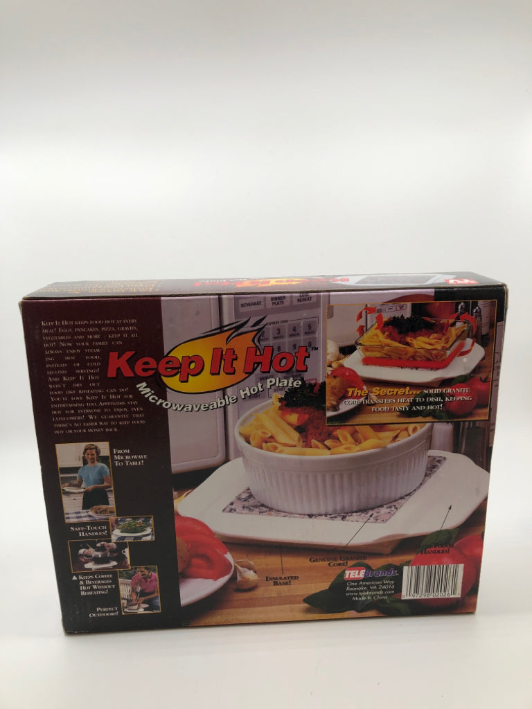 NIB MICROWAVEABLE HOT PLATE.