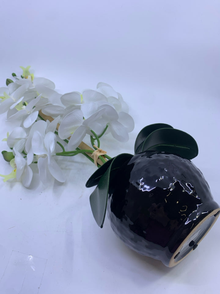 FAUX WHITE ORCHID FLORAL IN BLACK PLANTER.