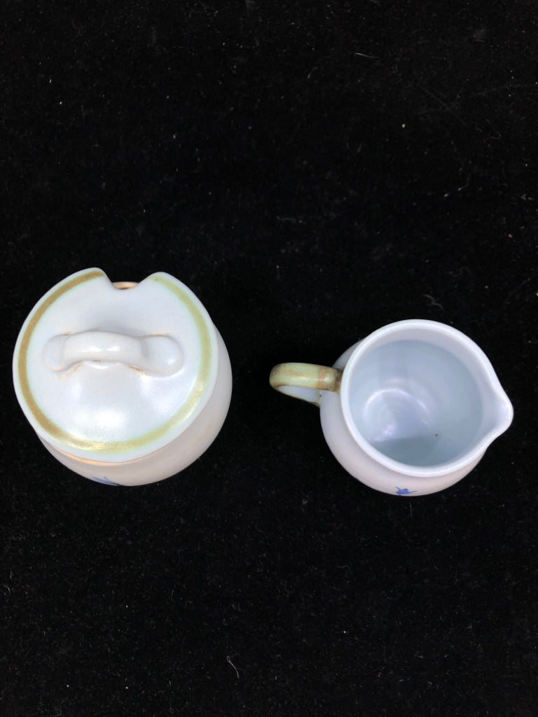 BLUE/GREEN POTTERY PAINTED CREAMER AND SUGAR.