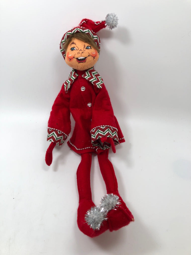 ANNALEE RED LONG LEGGED ELF DRESSED IN RED.