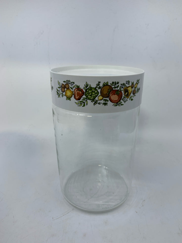 CLEAR GLASS CANISTER W/ VEGGIE PLASTIC TOP.