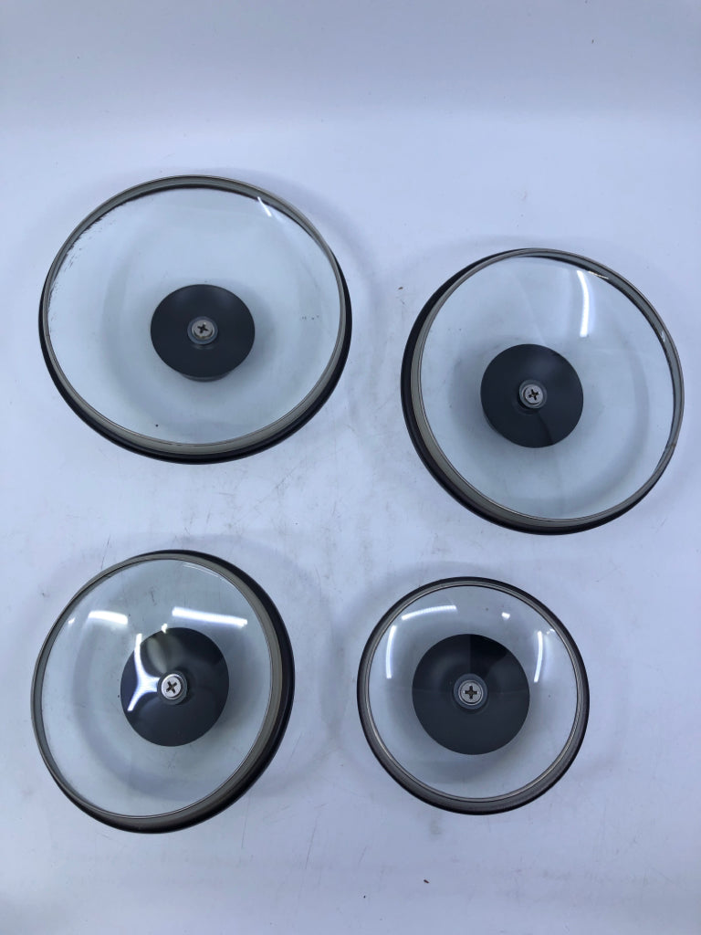 4 BROWN METAL CANISTERS.