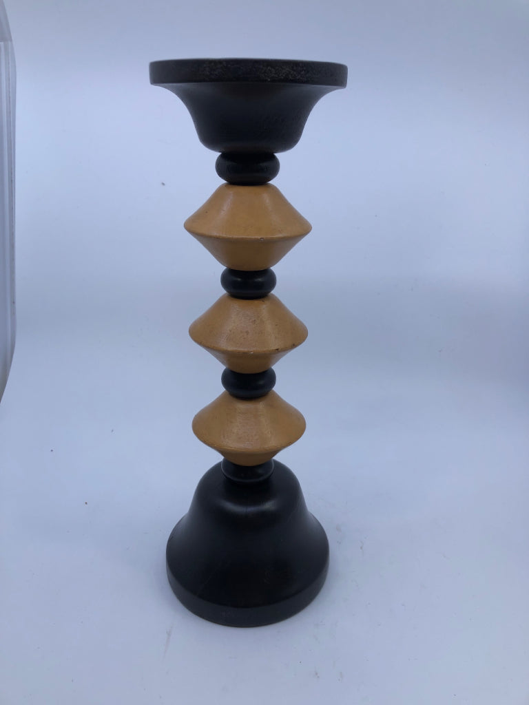 BLACK AND TAN PILAR CANDLE HOLDER.