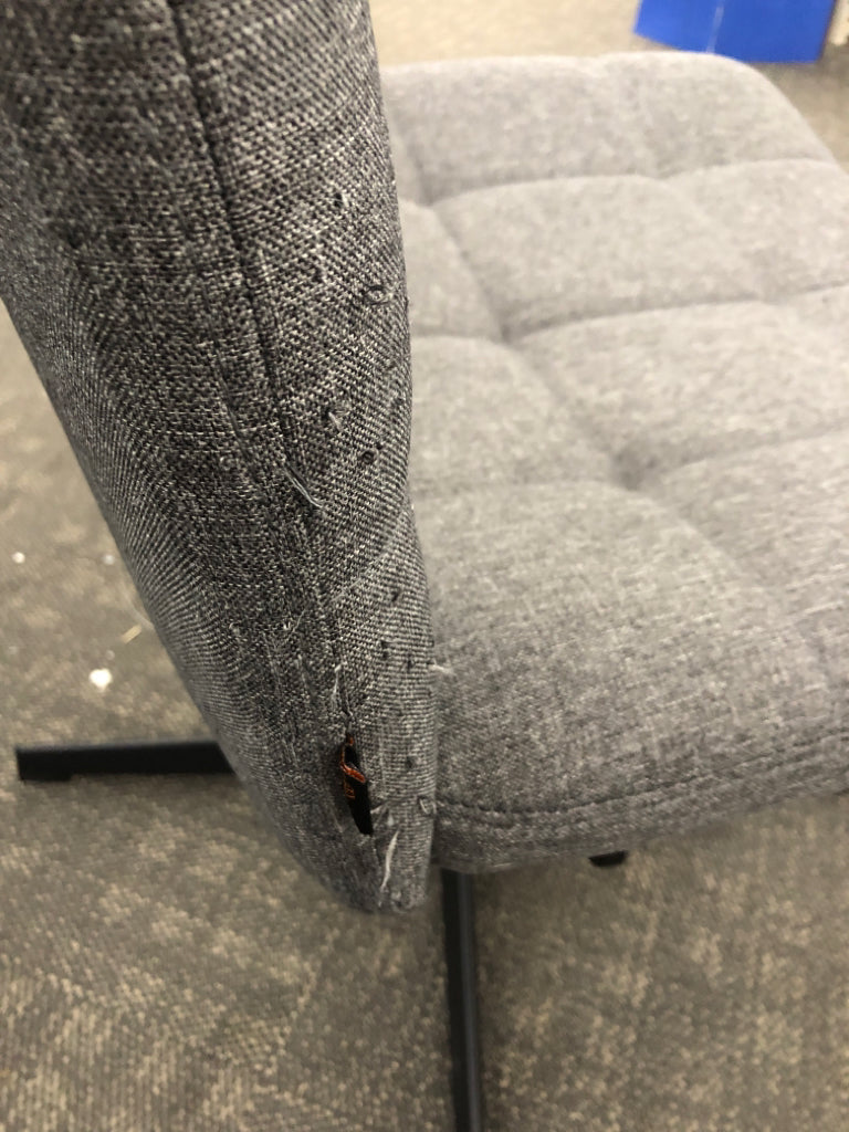 WIDE ARMLESS GREY FABRIC CHAIR.