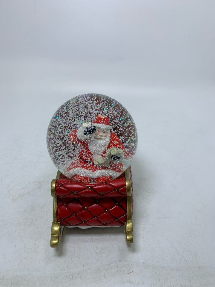 RESIN SLAY W/ SANTA READING LIST SNOW GLOBE.
