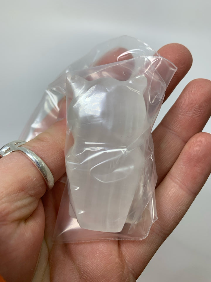 STONE CARVED CLEAR OWL IN BAG.