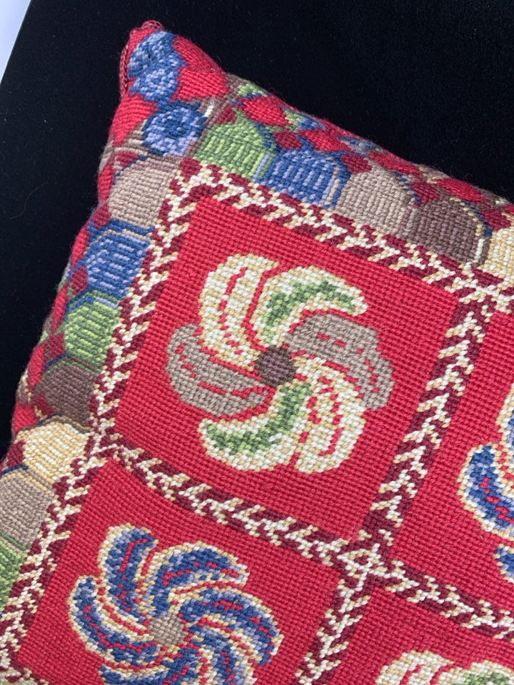 BLUE AND RED SQUARE PATTERN PILLOW.