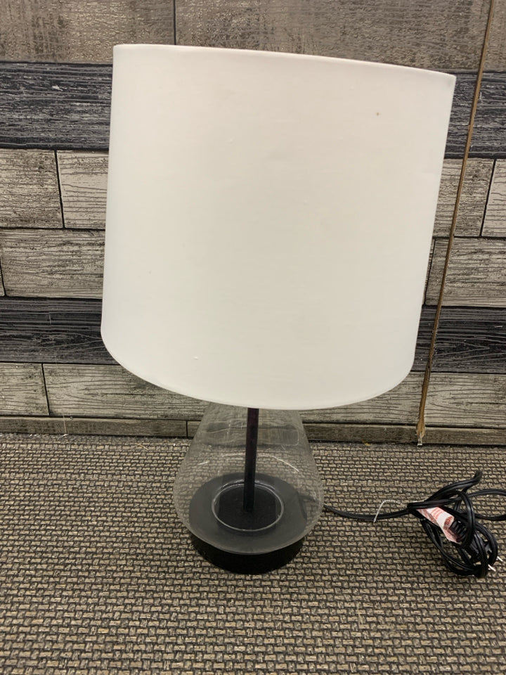 TRIANGLE SHAPED BASE LAMP W WHITE SHADE.