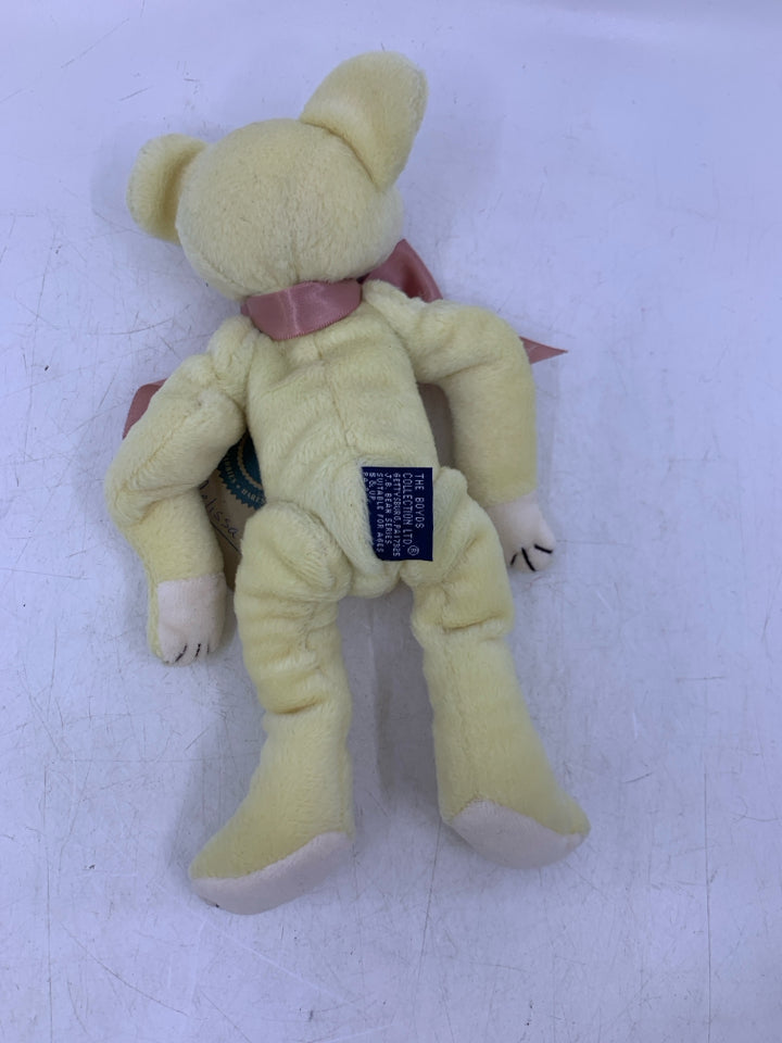 YELLOW BEAR W/ PINK BOW.