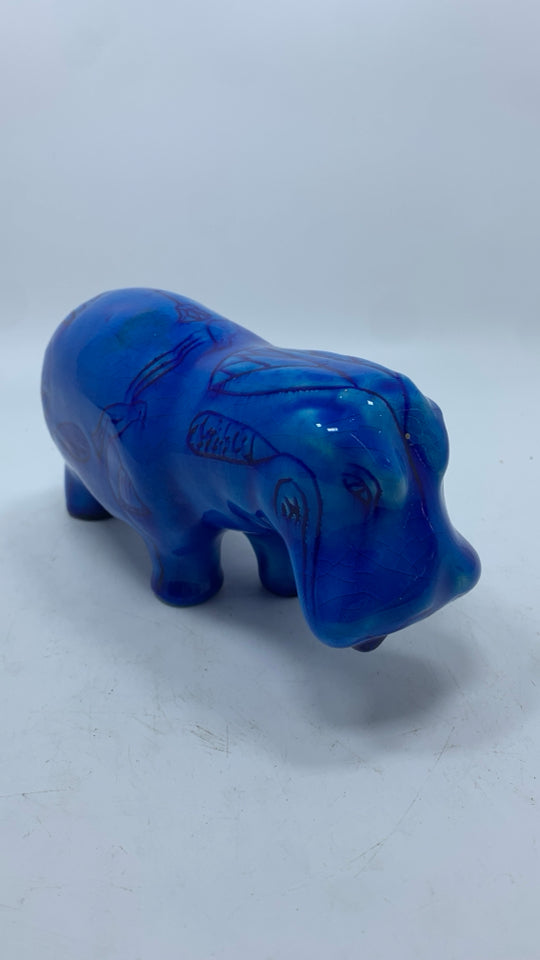 BLUE CERAMIC HIPPO W/SKETCH DESIGNS.