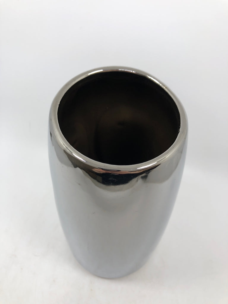 SILVER FACE VASE.