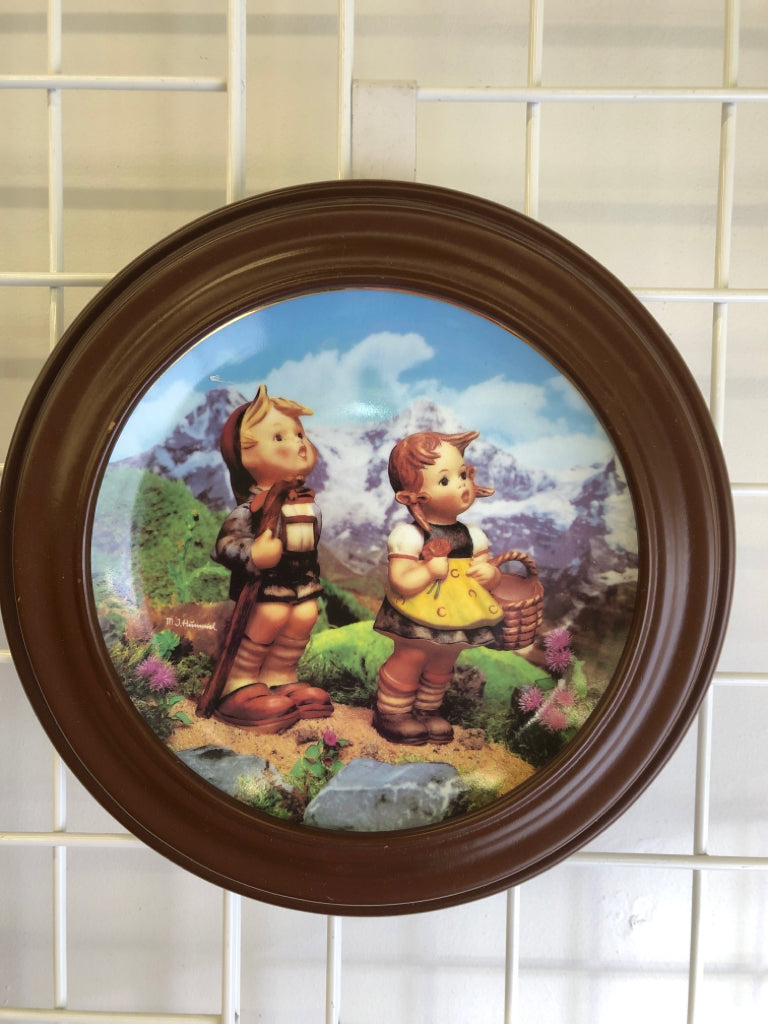 2 HUMMEL PLATES IN WOOD FRAME.