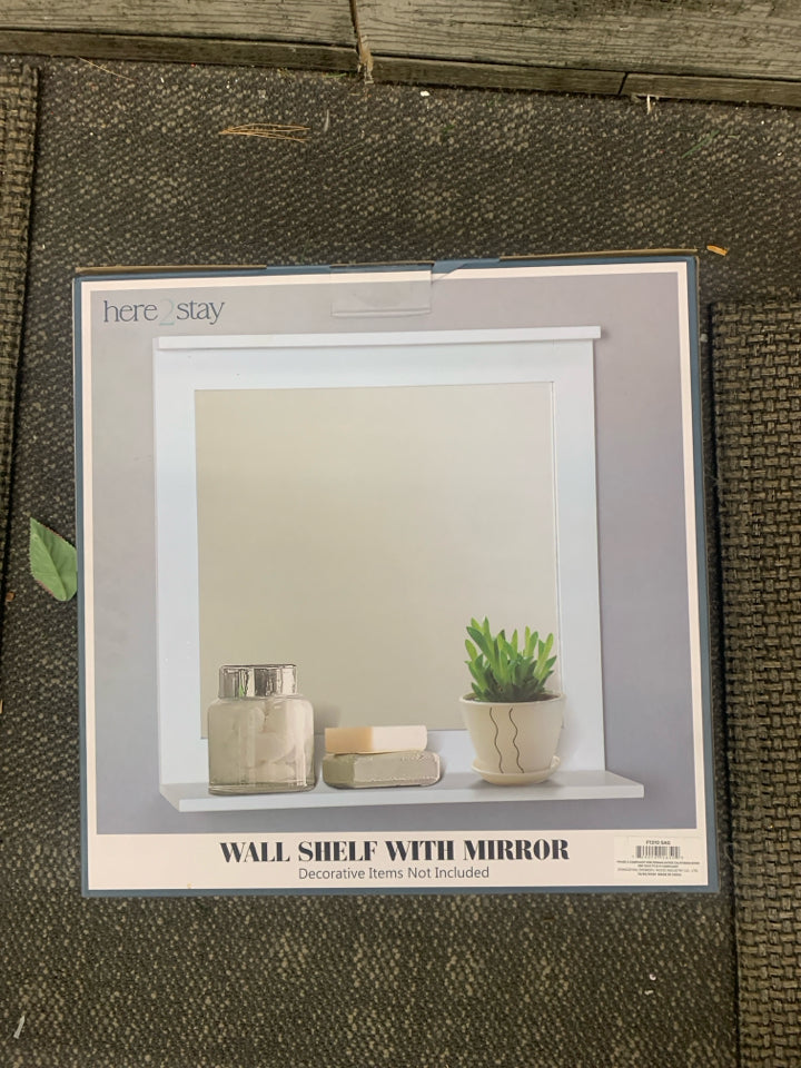 NIB WALL SHELF WITH MIRROR.