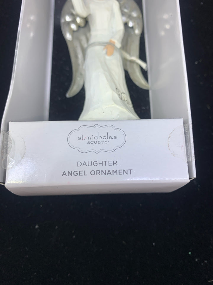 NIB ANGEL "DAUGHTER" HOLDING A GIFT ORNAMENT.