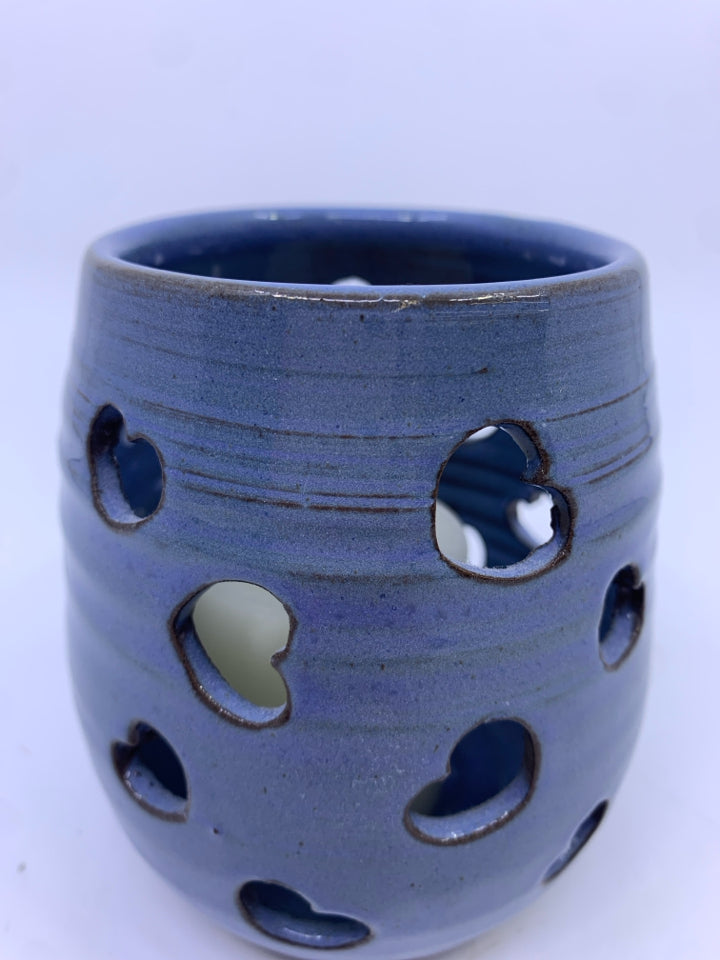 PALE BLUE POTTERY HEART CUT OUT TEA LIGHT HOLDER.