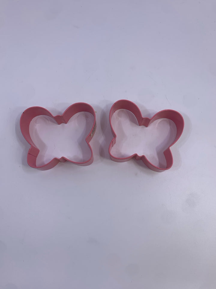 2PC PINK BUTTERFLY COOKIE CUTTERS IN BAG.
