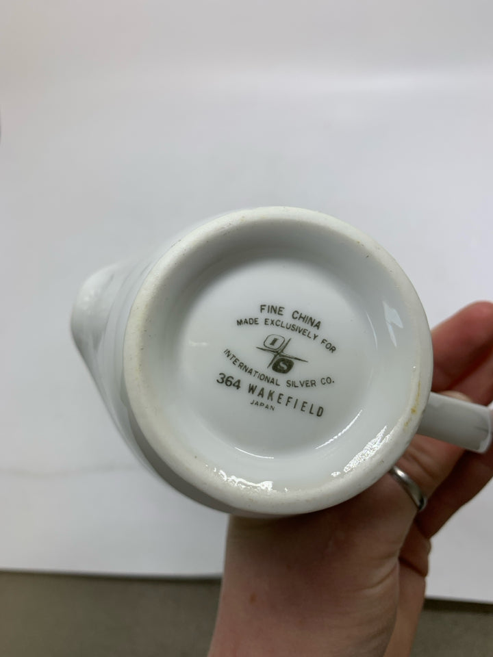 FOOTED WHITE LACE PORCELAIN CREAM/SUGAR SET W/ SILVER DETAILED.