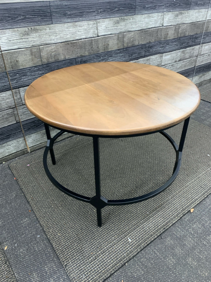 METAL BASE WOOD TOP CIRCLE COFFEE TABLE.