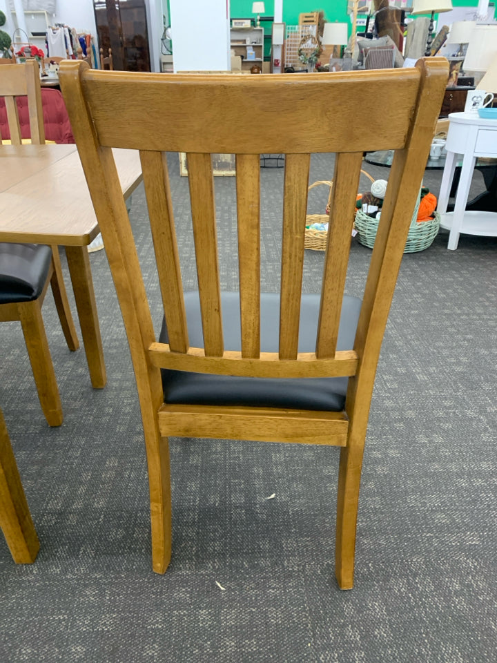 WOODEN KITCHEN TABLE W/ 4 CHAIRS.