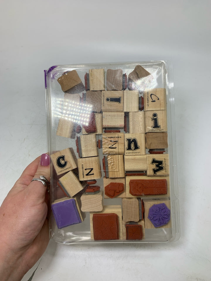 STAMPS IN CASE.