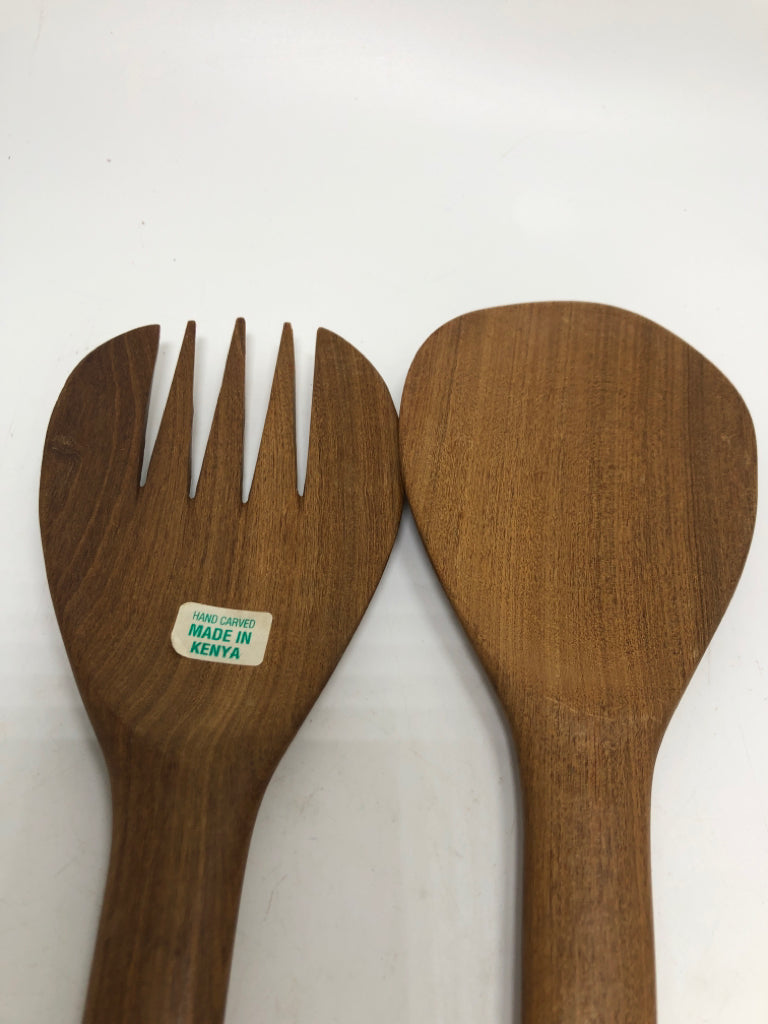 WOODEN SALAD SERVERS W/ RHINOCEROS ON HANDLE.