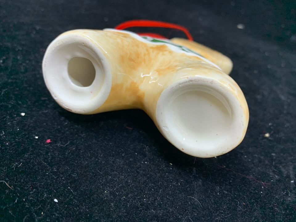 GINGERBREAD CERAMIC ORNAMENT.