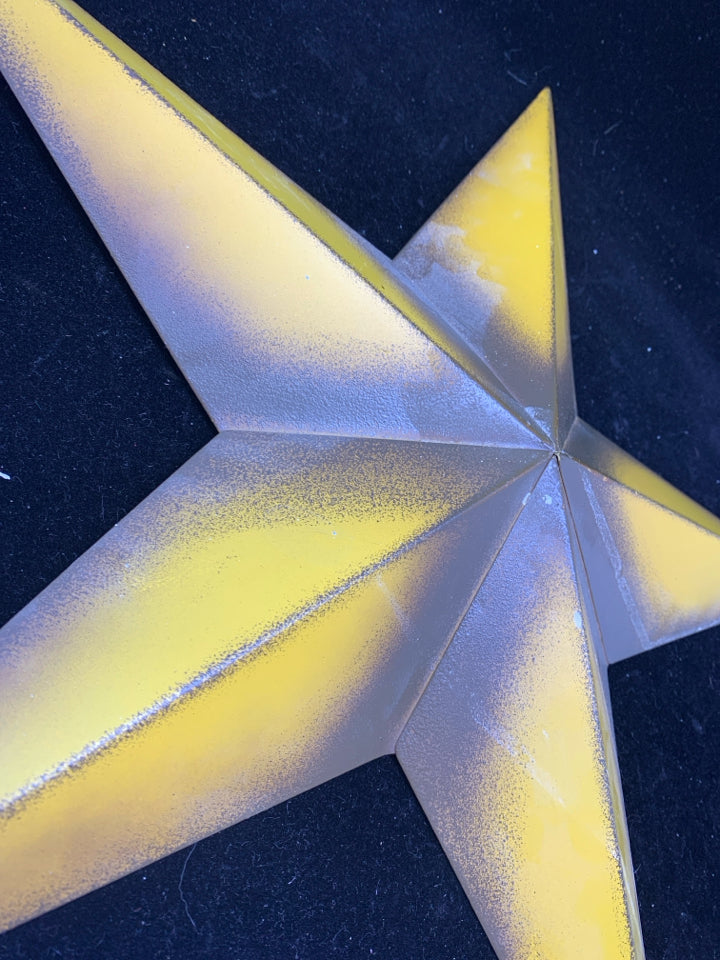 YELLOW METAL STAR.