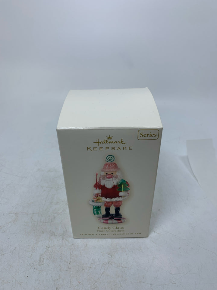 IN BOX CANDY CLAUS HALLMARK ORNAMENT.