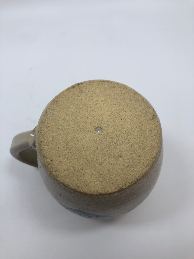 BEIGE PITCHER W/ BLUE HEART STONEWARE.