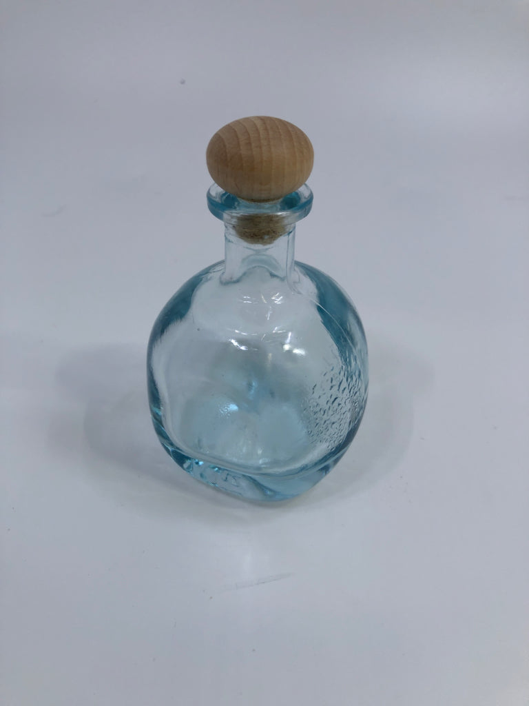 SM BLUE GLASS CONTAINER W/WOOD POP TOP.
