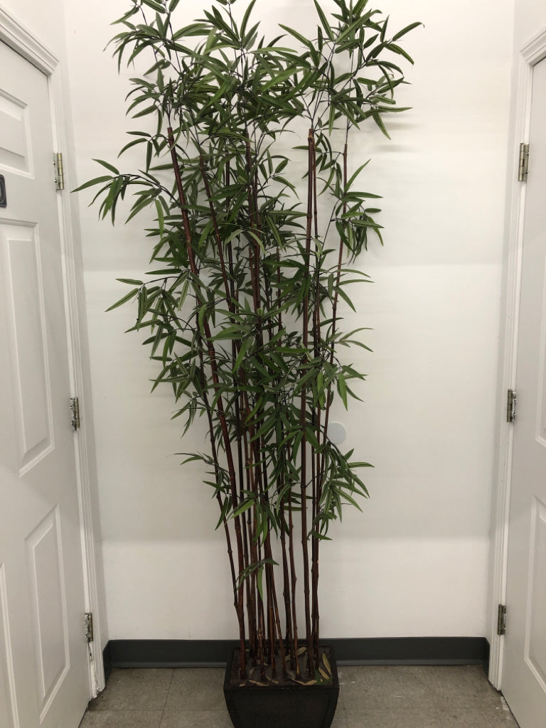 TALL FAUX BAMBOO PLANT IN HEAVY VASE.