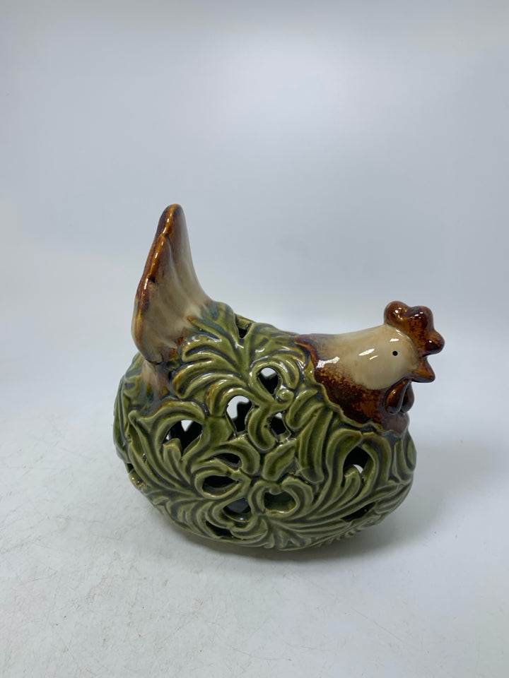 GREEN PIERCED SITTING HEN.