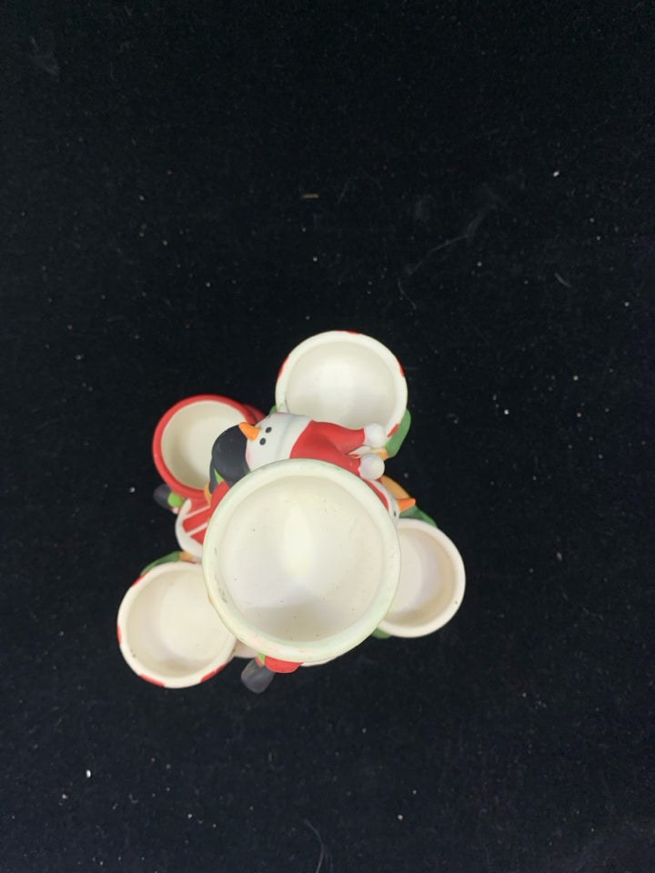 CERAMIC PILE OF SNOWMEN TEA LIGHT CANDLE HOLDER.