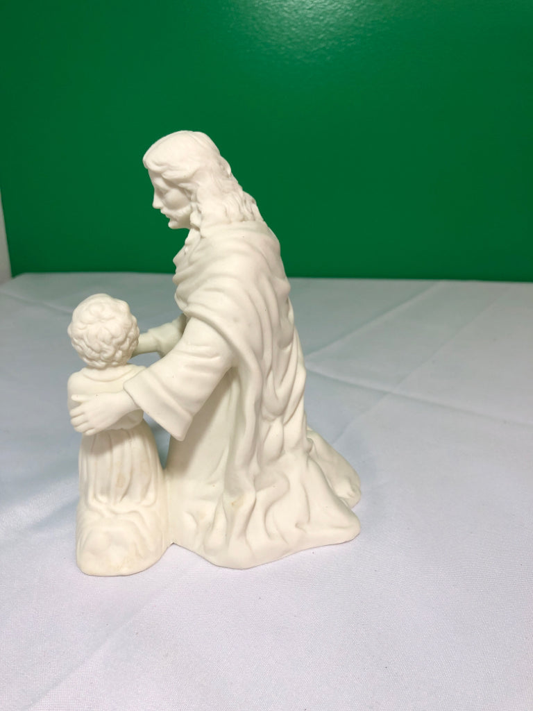 CREAM CERAMIC MAN AND CHILD.