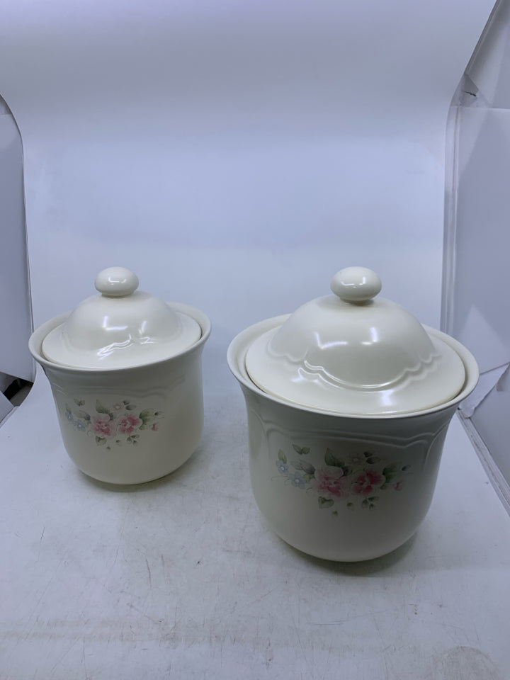 2 CREAM CANISTERS.