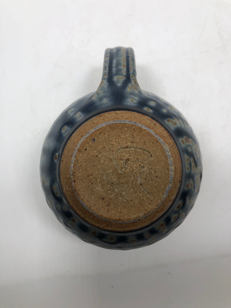 TEAL/BEIGE POTTERY MUG.