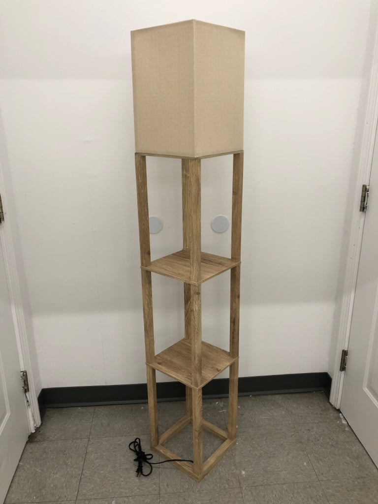BLONDE WOOD SHELF FLOOR LAMP W/ CREAM SHADE.