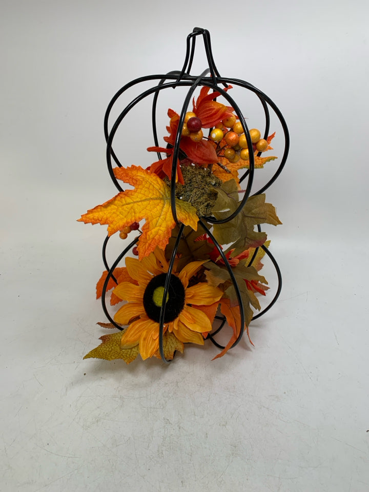2 TIER PUMPKIN CAGE W/ FALL BOUQUET INSIDE.