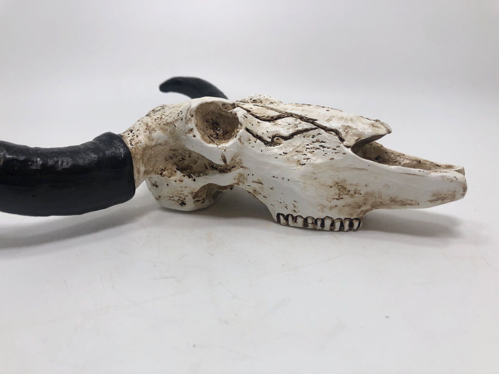RESIN COW SKULL.